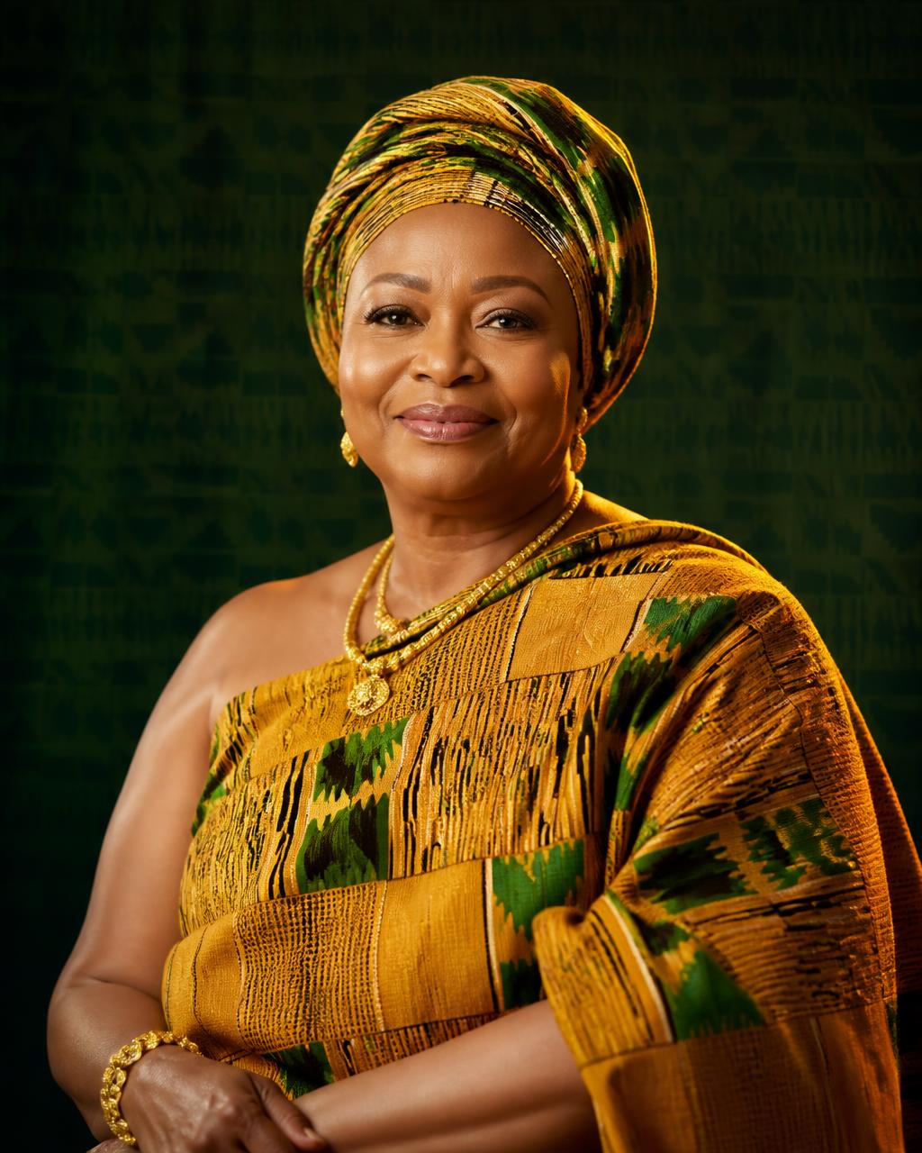 Mama Ghana, a Ghanaian woman in gold and green kente, the face of the Mama Ghana service